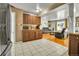 Open-concept layout connects the kitchen to the living area for easy entertaining at 7101 Alan Dr, Denver, CO 80221