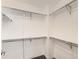 Walk-in closet with built-in shelving and storage at 15217 Xenia St, Thornton, CO 80602