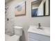 Basement bathroom with marble shower and vanity at 9880 E 160Th Pl, Brighton, CO 80602