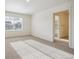 Bright bedroom with natural light, carpet, and a closet at 1638 Plata St, Lochbuie, CO 80603