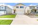 Attractive two-story home featuring a two-car garage, neat landscaping, and a welcoming entrance at 1638 Plata St, Lochbuie, CO 80603