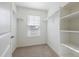 Spacious walk-in closet with shelving and rod for ample storage at 1638 Plata St, Lochbuie, CO 80603