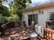 View of a wooden deck with shade and lounging furniture at 1843 S Urban Way, Lakewood, CO 80228