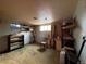 Dated basement with paneled walls and vintage carpet awaiting transformation into a modern living space at 1843 S Urban Way, Lakewood, CO 80228