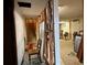 Unfinished basement with exposed studs and staircase, offering renovation possibilities and potential living area at 1843 S Urban Way, Lakewood, CO 80228
