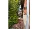 View of a side yard with a brick walkway leading to the back at 1843 S Urban Way, Lakewood, CO 80228