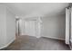 Spacious bedroom featuring neutral walls, plush carpet and a double door closet at 1580 N Franklin St, Denver, CO 80218