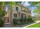Charming home with classic architectural details, inviting porch, and well-maintained landscaping at 1580 N Franklin St, Denver, CO 80218