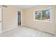 Bedroom with a closet, and large window with natural light and carpeting at 7999 Chase Cir # 31, Arvada, CO 80003