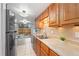 Open kitchen next to dining area featuring stainless steel appliances and ample cabinetry at 7999 Chase Cir # 31, Arvada, CO 80003