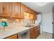 Bright kitchen features stainless steel dishwasher and tile backsplash at 7999 Chase Cir # 31, Arvada, CO 80003