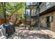 Outdoor seating area with a stone patio and convenient access to the building via metal stairs at 70 N Grant St # 10, Denver, CO 80203