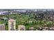 Scenic aerial view of a lush golf course integrated into a vibrant neighborhood setting at 70 N Grant St # 10, Denver, CO 80203