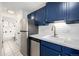 Updated kitchen featuring stainless steel appliances, subway tile backsplash and modern fixtures at 70 N Grant St # 10, Denver, CO 80203