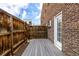 Patio with wood fence and composite deck off the rear of the property at 70 N Grant St # 10, Denver, CO 80203