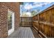Spacious wood patio with a privacy fence and access from the house at 70 N Grant St # 10, Denver, CO 80203