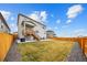 A view of the backyard and wooden fence at 14696 Bonsmara Dr, Mead, CO 80542