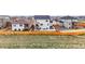 The backyard is fenced in wood and features a concrete patio at 14696 Bonsmara Dr, Mead, CO 80542