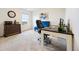 Bright office space with ample natural light, modern desk setup, and comfortable seating at 14696 Bonsmara Dr, Mead, CO 80542