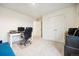 Study room with neutral color scheme, closet and spacious design with light colored carpet at 14696 Bonsmara Dr, Mead, CO 80542