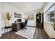 Cozy office space with a stylish desk, bookcase, and a window providing natural light at 14696 Bonsmara Dr, Mead, CO 80542
