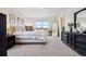 Spacious main bedroom with lots of light and furniture at 14696 Bonsmara Dr, Mead, CO 80542