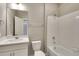 Clean bathroom with tub, shower, and single sink vanity at 18358 Field Mint Pt, Parker, CO 80134