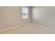 Cozy bedroom with neutral carpet and window for natural light at 18358 Field Mint Pt, Parker, CO 80134