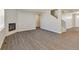 Spacious living room featuring a fireplace and modern flooring at 18358 Field Mint Pt, Parker, CO 80134