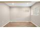Bright bedroom with wood flooring and two windows, offering ample natural light at 1264 Uinta St, Denver, CO 80220