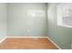 Bedroom features hardwood flooring and natural light at 1264 Uinta St, Denver, CO 80220