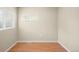 Bright bedroom featuring hardwood floors, and a window allowing ample natural light at 1264 Uinta St, Denver, CO 80220