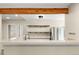 Open kitchen layout featuring stainless steel appliances, open shelving, and bar seating at 1264 Uinta St, Denver, CO 80220
