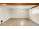 Bright living room featuring wood-look floors, a beam and natural light at 1264 Uinta St, Denver, CO 80220
