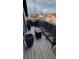 Relaxing rooftop deck features comfortable seating and outdoor ambiance at 1295 Utica St, Denver, CO 80204