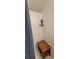 Bright shower features a wooden bench and sleek white tiled walls at 1295 Utica St, Denver, CO 80204