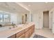 Bright bathroom features a double vanity, a soaking tub and a shower at 19 Red Fox Ln, Littleton, CO 80127