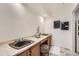 Elegant bathroom with dual sinks, marble counters, and stylish decor at 19 Red Fox Ln, Littleton, CO 80127