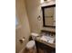 Small bathroom with granite countertop and updated fixtures at 13349 Krameria St, Thornton, CO 80602