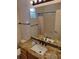 Bathroom boasts granite countertop and updated vanity at 13349 Krameria St, Thornton, CO 80602