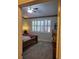 Primary bedroom with ceiling fan and wood furniture at 13349 Krameria St, Thornton, CO 80602