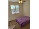 Bedroom with carpet and window with shutters at 13349 Krameria St, Thornton, CO 80602