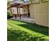 Spacious patio with pergola, seating area, and adjacent storage shed at 13349 Krameria St, Thornton, CO 80602