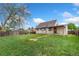 A lush backyard features green grass and a wooden fence at 3270 W 92Nd Pl, Westminster, CO 80031