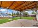 Spacious backyard with covered patio, perfect for outdoor entertaining and relaxation at 3270 W 92Nd Pl, Westminster, CO 80031
