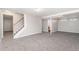 The finished basement includes a staircase and an open floor plan with access to other rooms at 3270 W 92Nd Pl, Westminster, CO 80031
