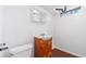 The updated bathroom features a wood vanity, modern medicine cabinet and shower at 3270 W 92Nd Pl, Westminster, CO 80031