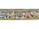 Expansive aerial view of a well-planned community with numerous homes and green spaces at 8691 S Sicily Ct, Aurora, CO 80016