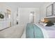 Spacious bedroom boasting neutral tones, soft carpet, and ample natural light at 8691 S Sicily Ct, Aurora, CO 80016