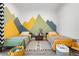 Playful ' bedroom with two beds, striped rug, and colorful mountain-themed wall art at 8691 S Sicily Ct, Aurora, CO 80016